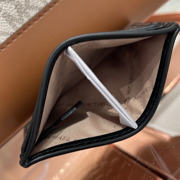 MICHAEL KORS
Reed Large Card Holder Case Wallet 
Brown /Black MK Signature 
NWT - Picture 12 of 16